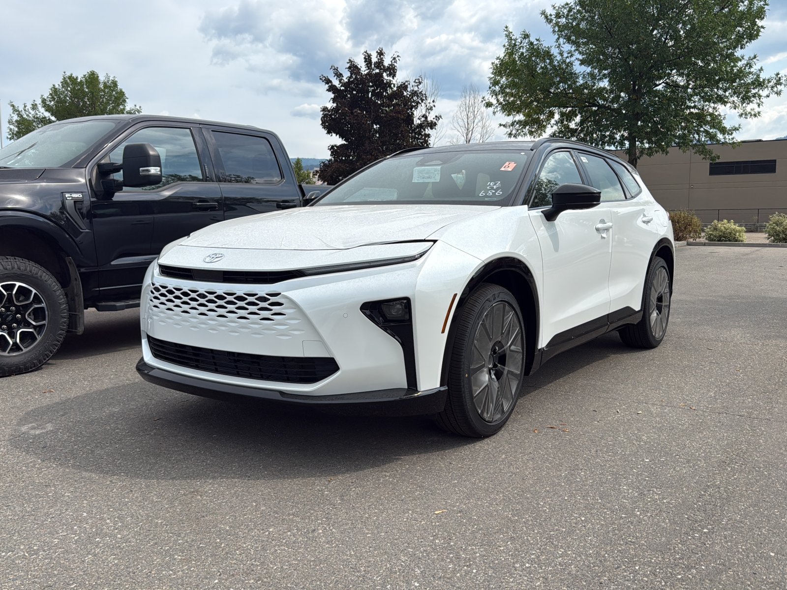 Oxygen White With Black R 2026 Toyota Crown Signia SUV / Crossover All-Wheel Drive Continuously Variable Transmission