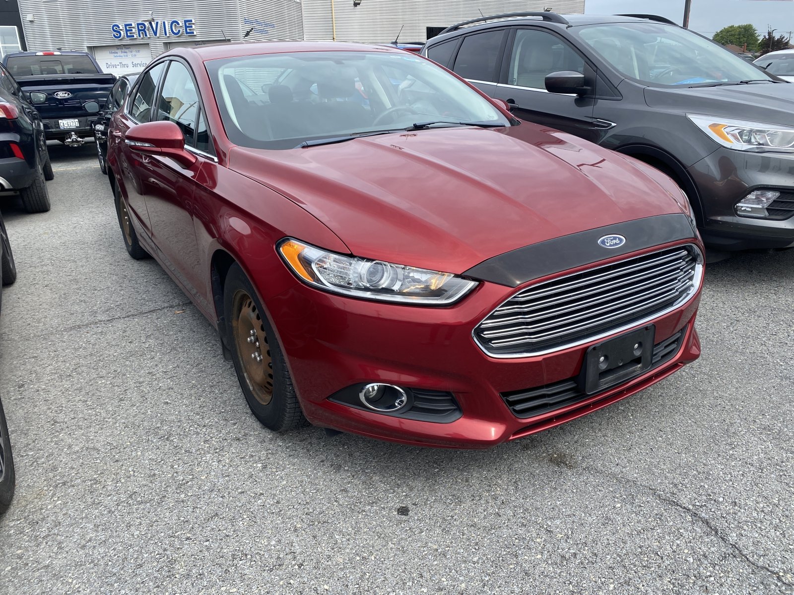 Ruby Red 2015 Ford Fusion Sedan Front-Wheel Drive